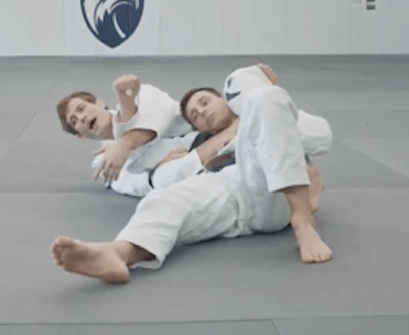 lock-a-figure-four-from-the-back-and-further-isolate-the-armbar-side-for-the-armbar-from-the-back