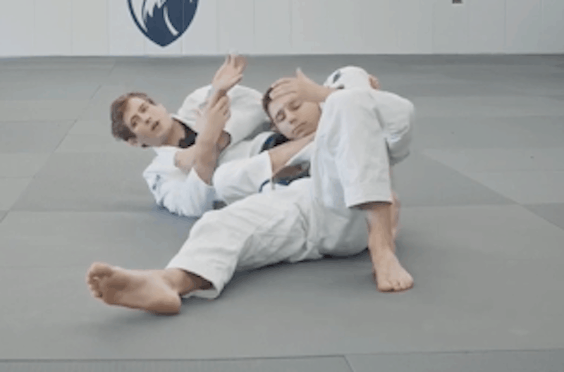 keep-your-opponent-from-defending-the-armbar-from-the-back-by-grabbing-the-wrist-and-pushing -with-your-legs